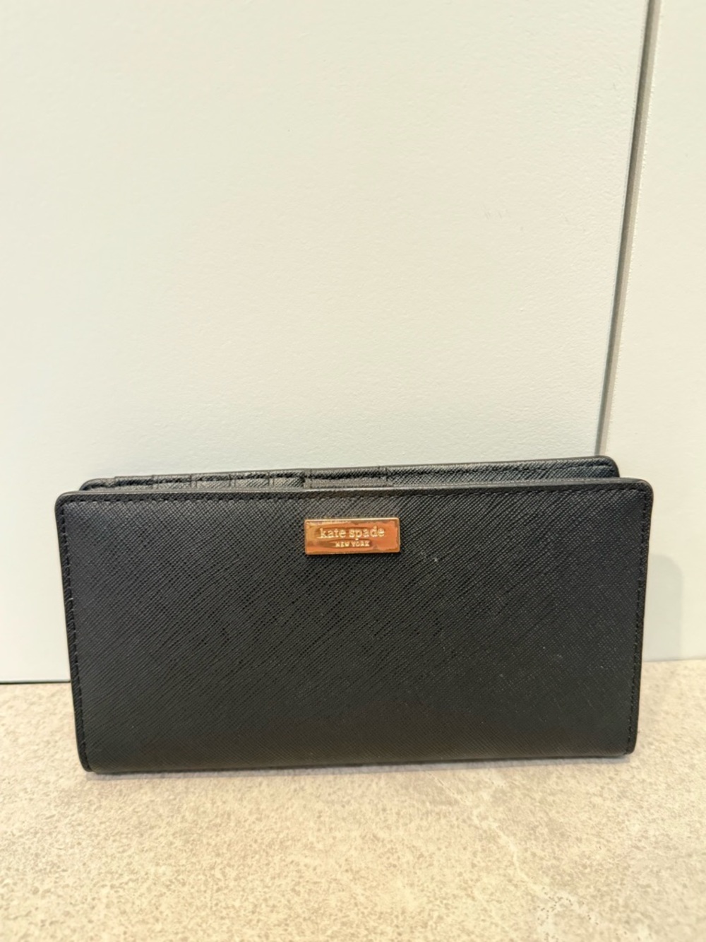 kate spade black leather continental wallet with gold plaque